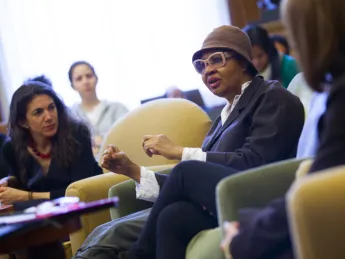 Journalist Johanna Berkman, left, looks on as Jamaica Kincaid makes a point.