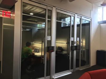 Students hard at work in soundproof study pods