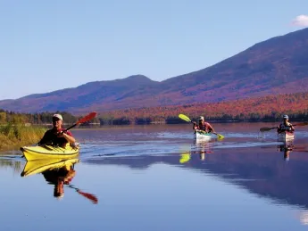 Paddlers enjoy the serenity of Flagstaff Lake, Maine.