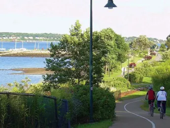 Cyclists of all levels can enjoy the coastal Eastern Promenade Trail in Portland.