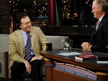 Scheft (left) shares a laugh with his boss.