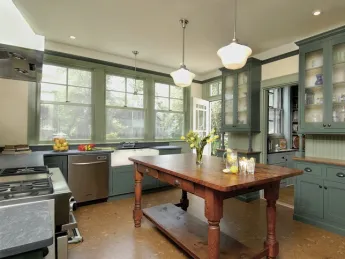 Kitchens in older homes—unlit, utilitarian, and at the rear of the house—reflect a role for women that we no longer tolerate, says remodeler Charlie Allen. This restoration aimed to connect the kitchen to the outdoors and the rest of the house.   
