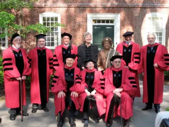 The 2011 honorary-degree recipients. Back row from left: John G.A. Pocock, Provost Steven Hyman, Sir Timothy John Berners-Lee, President Drew Faust, Her Excellency Ellen Johnson Sirleaf, David Satcher, and Plácido Domingo. Front row from left: Dudley Herschbach, Rosalind Krauss, and James R. Houghton. Not pictured: The Honorable Ruth Bader Ginsburg