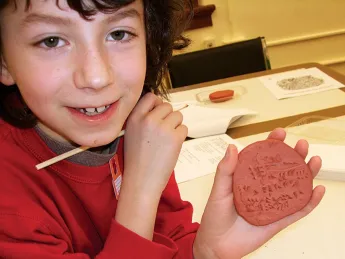 Do-it-yourself cuneiform at the Peabody Museum’s Wonders of Writing family event