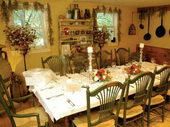 Meals are served at two communal tables in the restored barn.