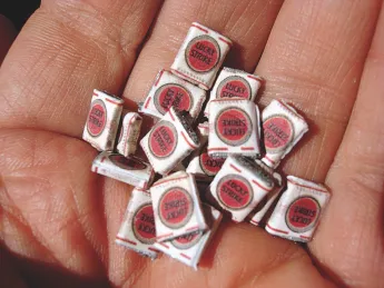 Getting them while they’re young: tiny cigarette packs, meant for children to incorporate into their play with dolls or toy soldiers