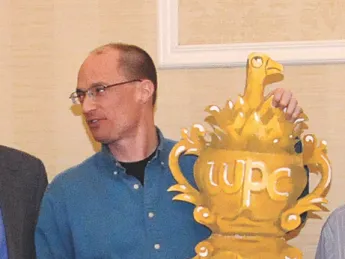 Mark Saltveit displays for the first (and last?) time the World Palindrome Championship trophy.
