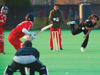 A bowler delivers.