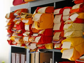 Located in Harvard Square, the Tibetan Buddhist Resource Center hosts shelves of traditional Tibetan volumes, which the organization scans, catalogues, and returns to their owners.
