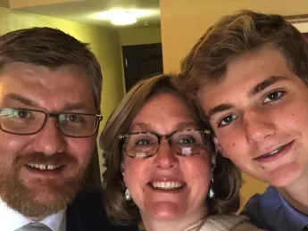 Ian Miller, Crate Herbert, and their son Liam