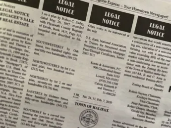 A page from a newspaper showing legal notices