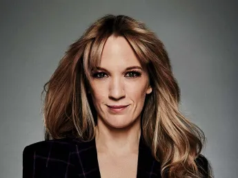 A portrait phot of Emily Carmichael