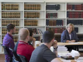 President Drew Faust addresses the 14 veterans who participated in the Warrior-Scholar Project at Harvard. The week-long pilot program, which involved democracy-themed seminars as well as reading and writing workshops, ran from July 6 to July 12.