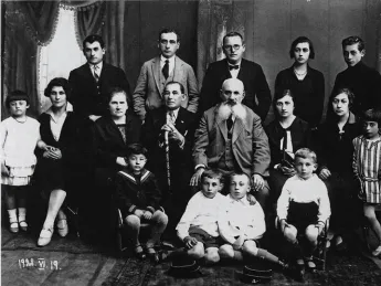 The Levy family in 1928; Jacob holds the cane. Only he and Rivka Levy (far left, flounced dress) survived the Nazis.