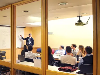 Gawande at his weekly meeting with his research team, discussing initiatives to improve surgical safety