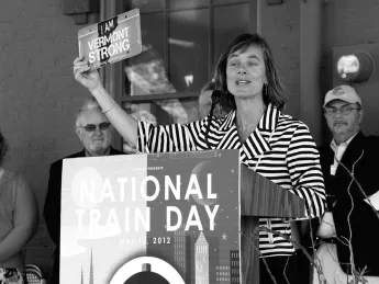 Sue Minter displays the special license plate, &ldquo;I Am Vermont Strong,&rdquo; issued by the state in the wake of Tropical Storm Irene to raise money for the Vermont Disaster Relief Fund and the Vermont Food Bank.