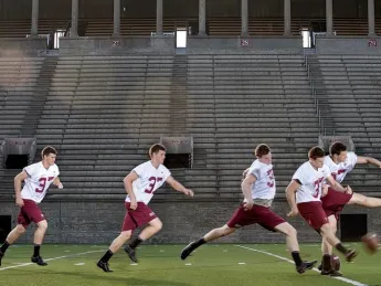 In Harvard Stadium, David Mothander practices a kickoff, using the ubiquitous &ldquo;soccer-style&rdquo; kicking technique. Scroll down for a <a href="#placekick">video.</a></p> 
