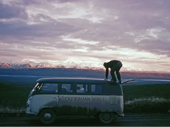 On June 18, at the first sight of Mount McKinley near Wonder Lake, Alaska, Peter Carman climbed atop the team's VW Microbus for a better look.