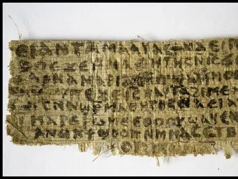 The front of a papyrus fragment from an early Christian codex on which is written a previously unknown gospel, the Gospel of Jesus's Wife.
