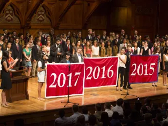 The College class of 2017 receives its banner.