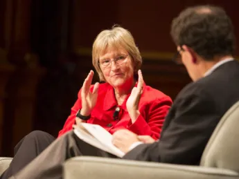 Journalist Nicholas Kristof in conversation with President Drew Faust in Sanders Theatre