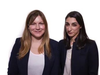 A portrait of Eileen Connor and Toby Merrill of the Harvard Law School's Project on Predatory Student Lending