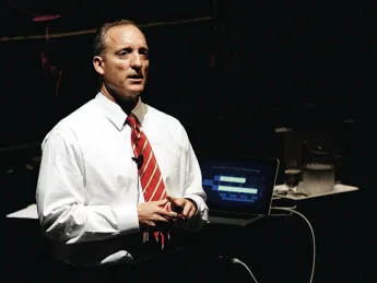 Michael D. Smith briefing faculty and staff members on September 15