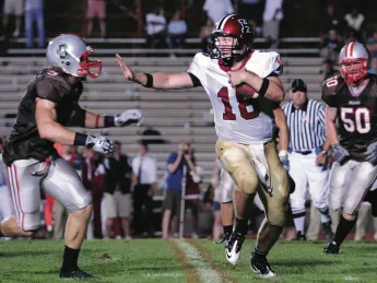 Quarterback Andrew Hatch’s forte is passing, but Brown’s defenders kept him on the run in a 29-14 blowout.