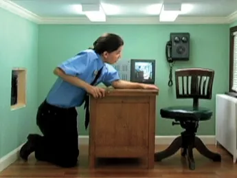 A scene from Meredith James’s video <i>Day Shift </i>, starring James herself