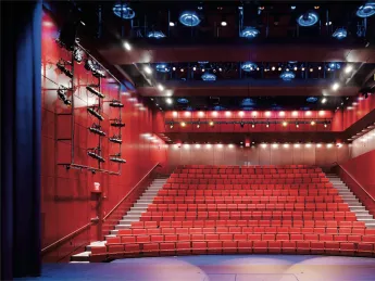 The intimate performance space, seen from the stage, is equipped with thoroughly modern theater technology.  