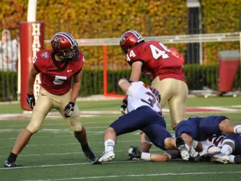 Off to the races: Tight end Kyle Juszczyk (44) shook off tacklers on a 59-yard pass play, giving Harvard a 28-0 halftime lead over Bucknell.