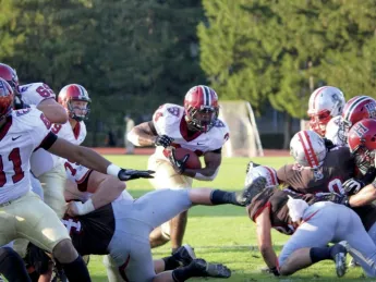 Tailback Treavor Scales scored four touchdowns in a 45-31 slugfest at Brown. His offensive line, said Scales, opened holes "as wide as an 18-wheeler." 