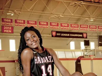 Olympian and Harvard sophomore Temi Fagbenle at Lavietes Pavilion, where women's basketball Ivy championship banners hang in profusion 