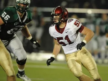 The Harvard defense allowed 378 passing yards, but held Dartmouth to just 19 yards rushing. Jacob Lindsey (51), subbing for injured linebacker and captain Bobby Schneider, led the defensive unit with 12 tackles. 