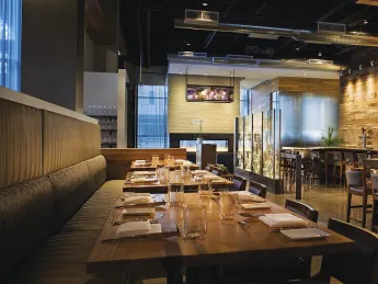 Despite its large size, Catalyst&rsquo;s warm, modern environs lend intimacy to dining. 