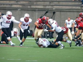 Paul Stanton Jr. ’16 (number 29) rumbled for 102 yards--43 coming on a blast up the middle that pushed the Crimson lead to 17-0 at halftime.