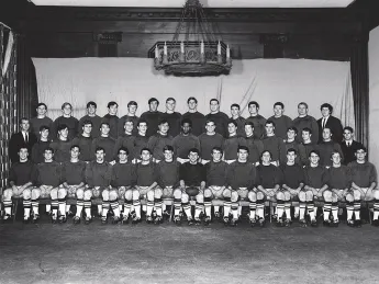Happy campers: For their team photo, a day or two after The Game, the Crimson wore practice jerseys, giving them rather a raffish look.