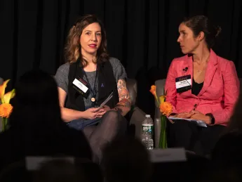 Recovery coach Raina McMahan (left) talks with addiction-medicine physician Sarah Wakeman about her stigmatizing experiences with health care and drug use.