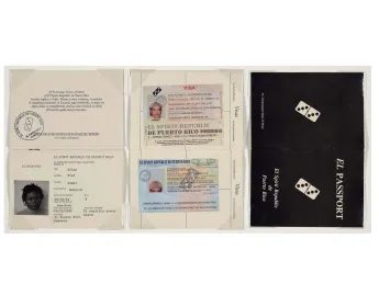 A spoof passport written in Spanglish for the fictional country El Spirit Republic of Puerto Rico, with a domino in place of a national seal on its cover