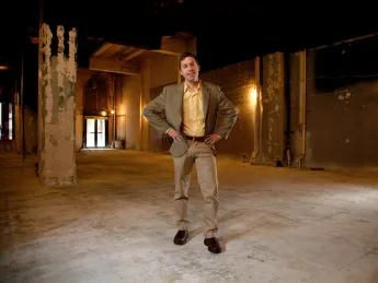 Glen Whitney ’89 stands in an as-yet-unfinished space at the MoMath museum, slated for a 2012 opening.
