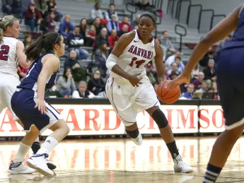 Harvard forward Temi Fagbenle ’15 in action against Yale last year 