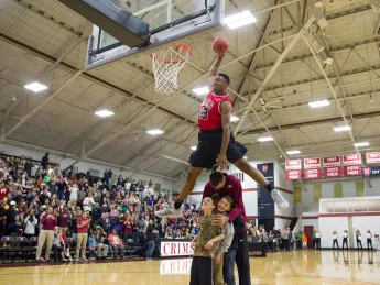 Zena Edosomwan ’17, soaring over teammate Balsa Dragovic '19 and two fans to win the dunk contest at Crimson Madness, will be the team's primary threat in the post.