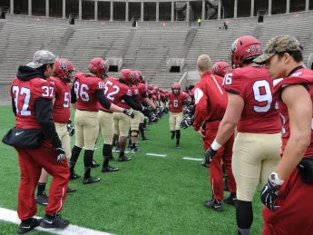 Senior Day: Sean Ahern (6) and other members of the class of 2016 were honored before their final Harvard Stadium game. There also was a moment of silence to commemorate the victims of Friday’s terrorist attacks in Paris. 