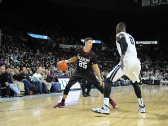 Freshman Corey Johnson sank five three-pointers against Providence on Saturday, the most by any Harvard player since then-senior Laurent Rivard sank six in 2014.