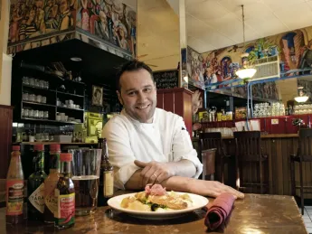 Above: Tupelo chef Rembs Layman prepares satisfying fare: here, fried catfish.