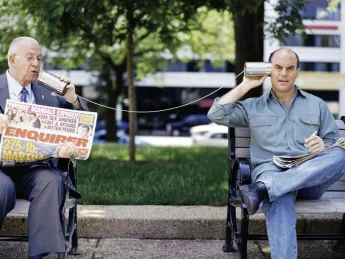 Carl Kassel (left), announcer for National Public Radio’s weekly <em>Wait, Wait...Don’t Tell Me!</em> clowns with its host, Peter Sagal.