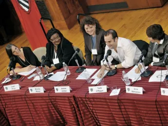 Panelists at the tenth-anniversary symposium discuss how their time as Radcliffe Fellows helped them bridge boundaries between genres. From left to right: English professor Leah Price, painter Beverly McIver, filmmaker Jeanne Jordan, composer Tarik O’Regan, filmmaker Anne Makepeace, and lawyer Hauwa Ibrahim.