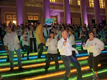 Kicking up their heels: a “flash mob” started off the evening’s dancing with a choreographed routine to the tune of James Brown’s “Papa’s Got a Brand New Bag.”