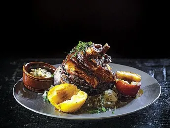 Bronwyn is a great place to hunker down for a wintry meal of sausages, beer, <i>pierogi,</i> and the &ldquo;giant pork knuckle.&rdquo; (pictured)