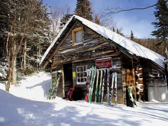 Harvard Mount Washington cabin in the snow 